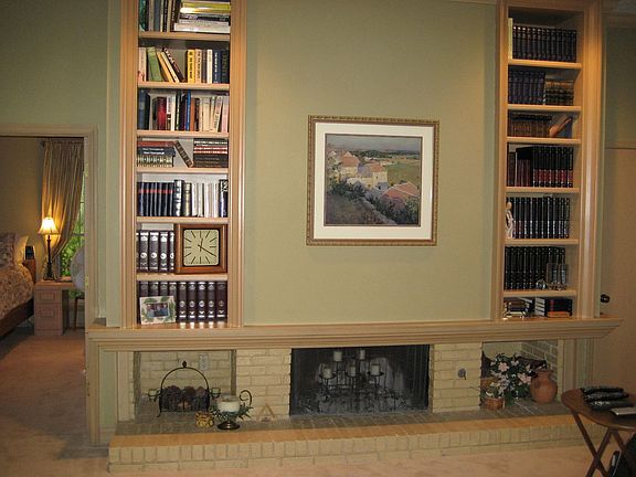 Book cases w/woodburner