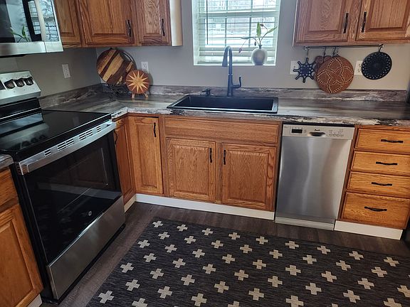 Every appliance in the kitchen is brand new.