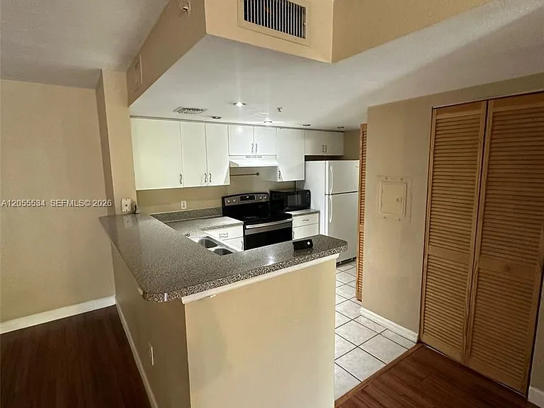 5035 Wiles Rd #203 — Photo 23