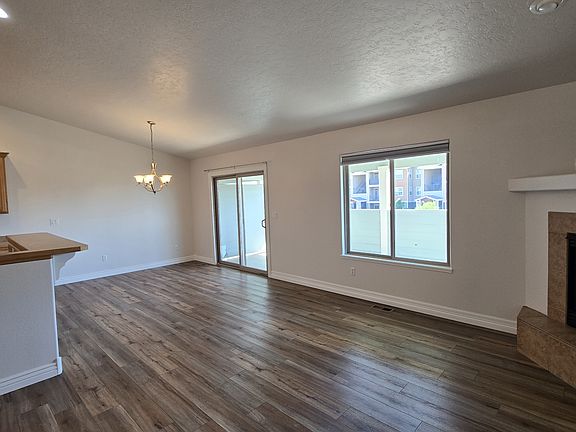 Dining area and sliding glass door to back covered deck.