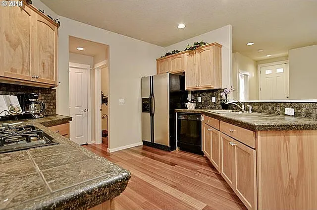 7155 NE Stonewater St — Photo 5