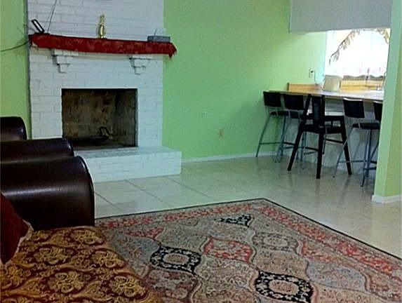 Living room with wood burning fireplace!