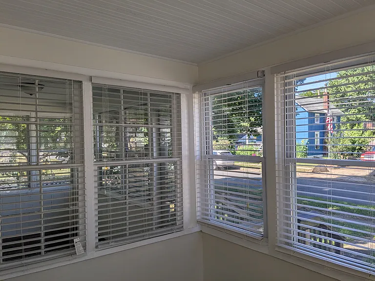 Sunroom
(The 2 windows on the left are to the front Screened Porch. The 2 on the right are to the road)