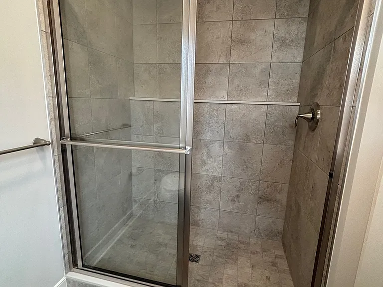 Master Bathroom with walk-in Tile shower