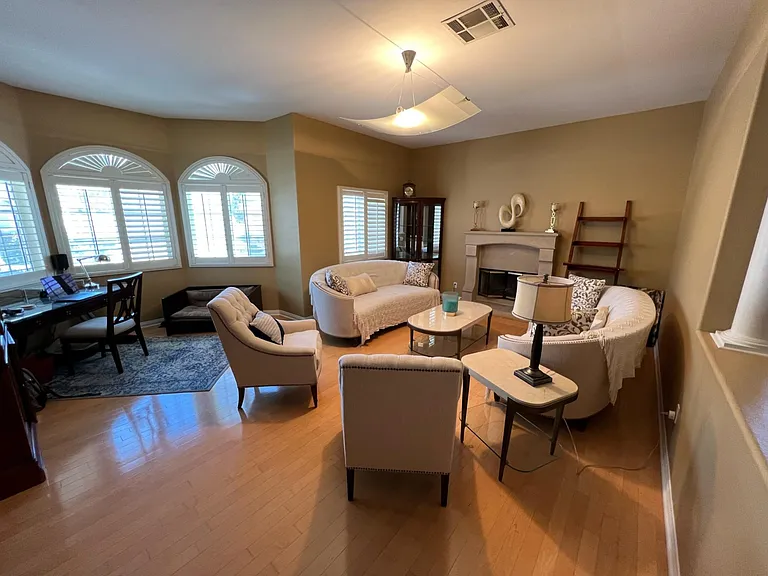 Great room with high ceilings, bay windows
