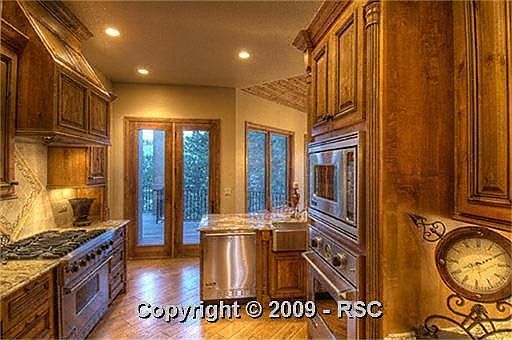 Kitchen with Custom Granite, Alder & Double Oven