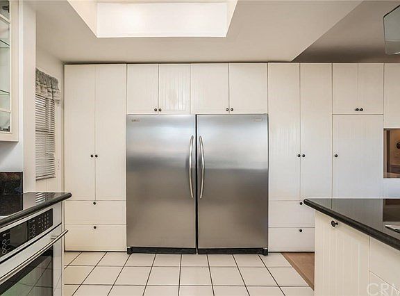 Pantry and custom area from freezer and refrigerator.