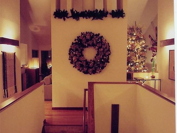 Vaulted ceilings, custom wall lighting, and gorgeous architectural designs as you enter on the main.