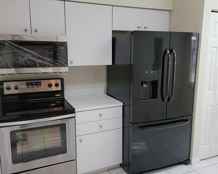 1st image of 835 NE 212th Ter APT 5