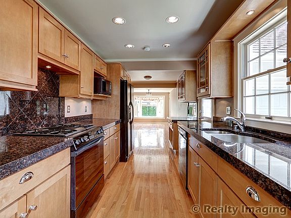 high end cabinets with rollouts, lighting & more
