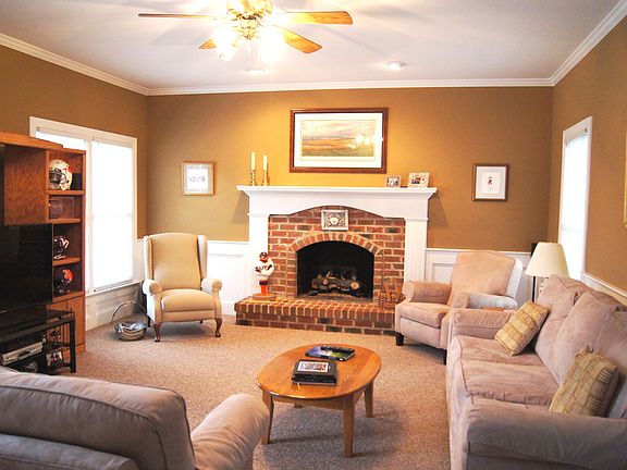 Den with gas fireplace