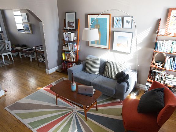Living room with view of the dining room.