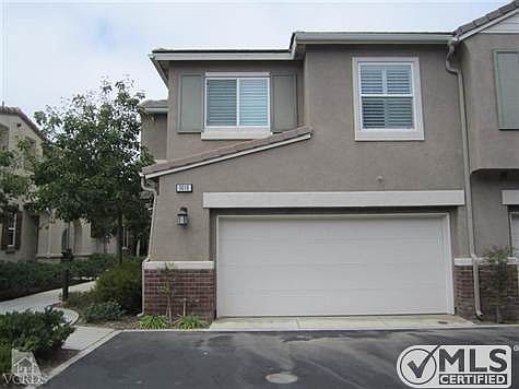 This is an end unit! Garage and side of unit