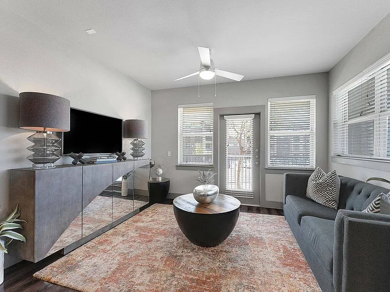 Bright and cozy living space with sleek modern furnishings