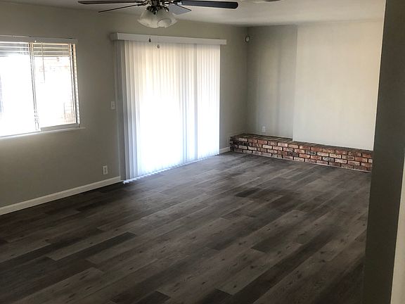 Large open living area with lots of natural light