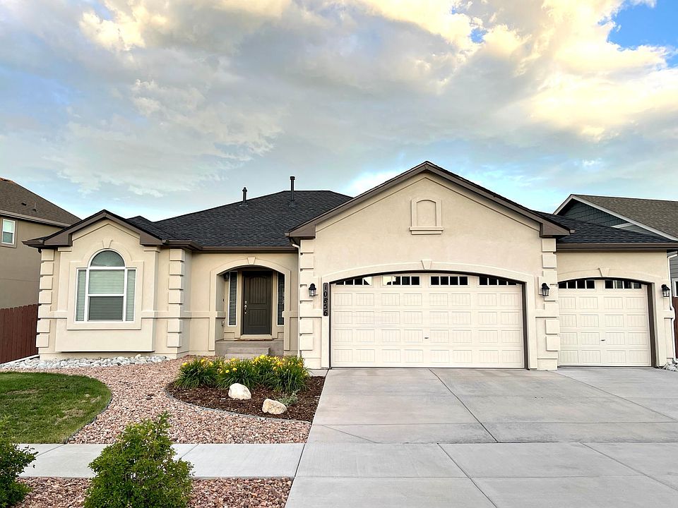 Beautiful 4-year old stucco ranch home in North Fork at Briargate with 3-car garage