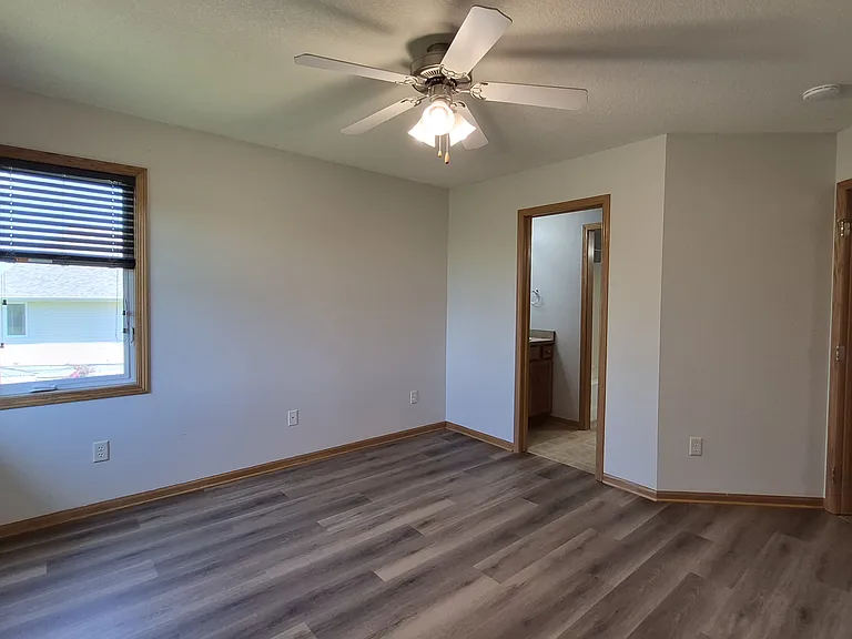 Master Bedroom connects to main bath and separate vanity.