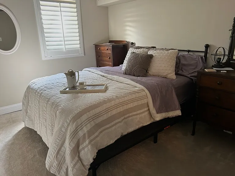 Bedroom that's furnished. Also there is a tv mounted to the wall opposite the bed. You can stream whatever you like on it.
