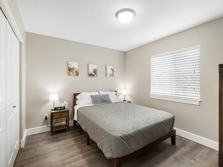 Bedroom #3 - queen bed, dresser and full length mirror are along the opposite wall