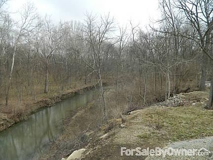 veiw of honeycreek and woods
						:
						woods can be hunted on, lots of deer