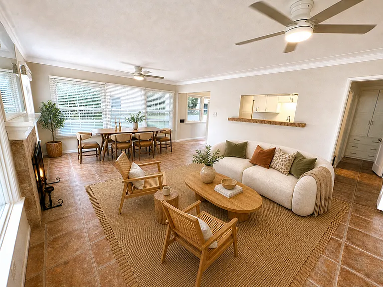VIRTUALLY STAGED - living room kitchen pass through view