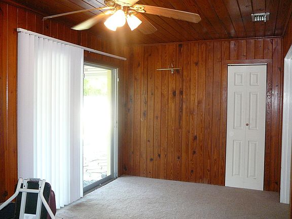 Den opens to pool area