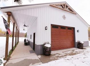 4921 Snowridge Dr, Elmira, MI 49730