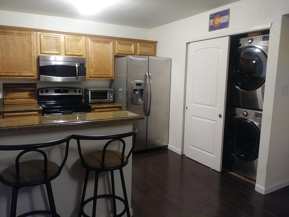 Kitchen w/ Stainless Steel Appliances and Pantry / Full-Size LG Washer and Dryer