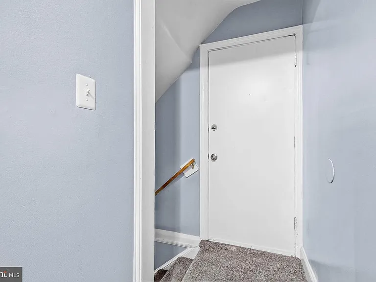 Side Entrance Door, Stairs to Lower Level.