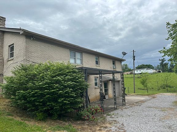 Back view of house and driveway