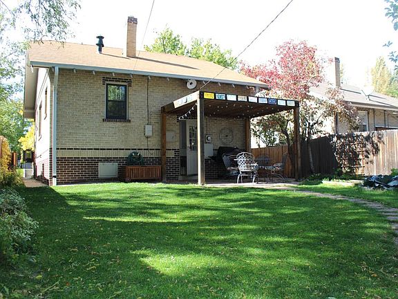 Huge backyard with pergola.