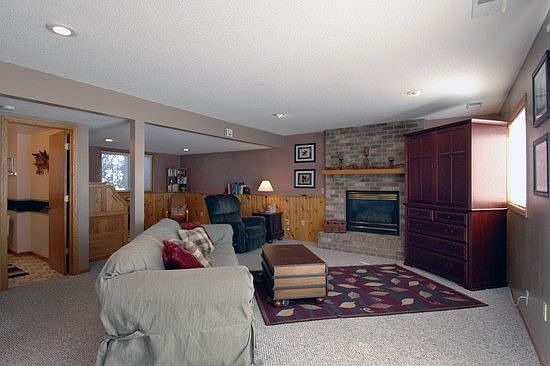 The large family room has a 2nd walkout to a concrete patio, and fenced yard.