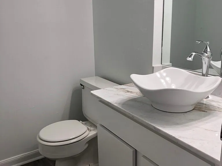 Half bath downstairs = marble countertop