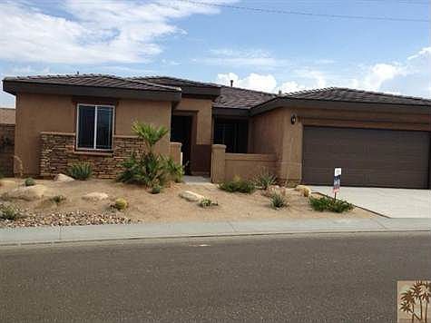 Front of new home with Desertscape on auto-drip watering system.