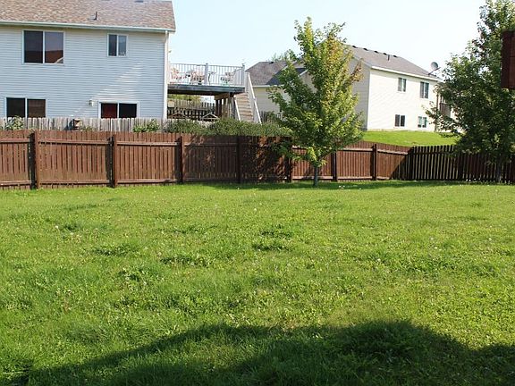 Completely fenced large back yard.