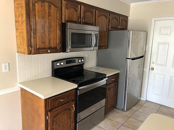 Appliances are less than 4 yrs old. Door is the entrance from the 2-car garage.
