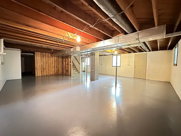 Walk-out basement perfect for crafts & hobbies. It's time to unleash your artistic side and turn this empty canvas into something magical! #CraftyRental