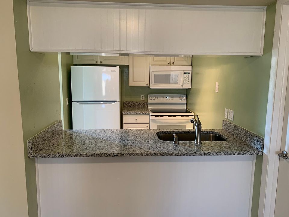 Remodeled kitchen with brand new appliances, sink, faucets, and granite countertops