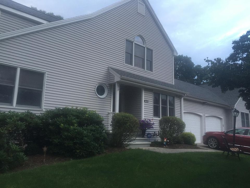 Exterior front with large 2 car garage with lots of overhead storage for holiday decorations etc