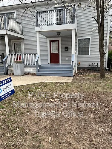 429 E 63rd Ter Photo 1