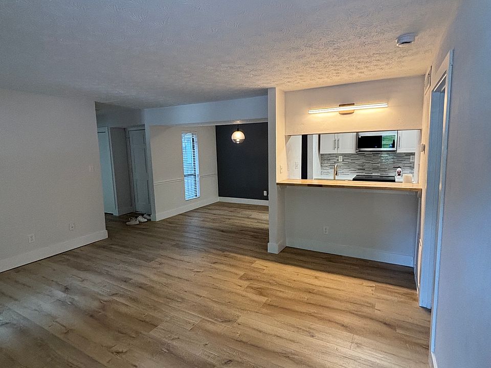 Living and Dining, Bar Area looking into Kitchen