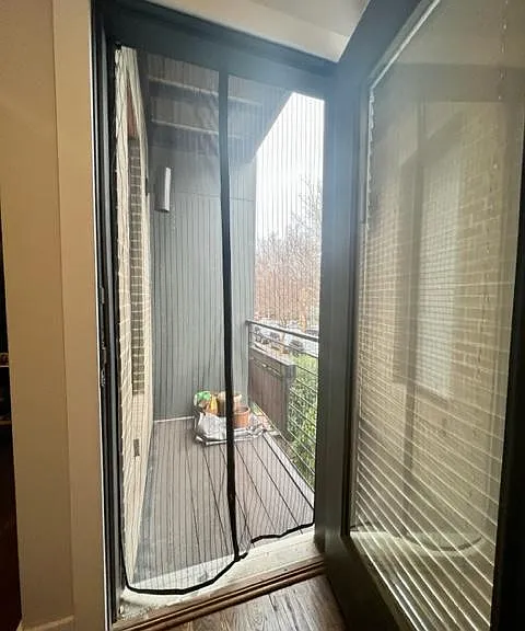LIVING ROOM PATIO ENTRANCE WITH NET
