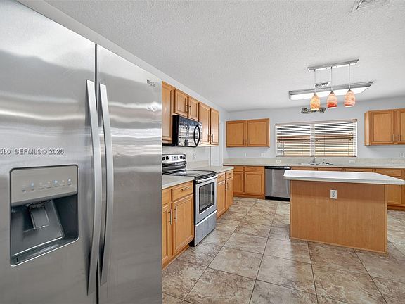 5th image of 6762 NW Daffodil Ln