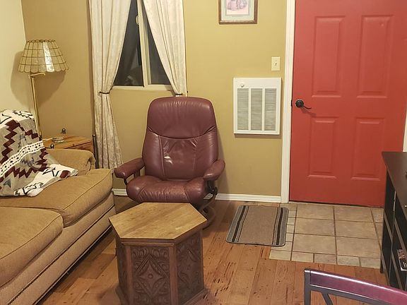 Living room with Roku TV & services