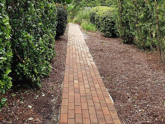 Walkway to Screened Patio
