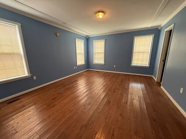 Master bedroom has his and her closets