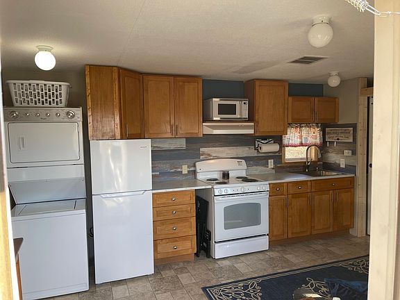 Living area with washer and dryer