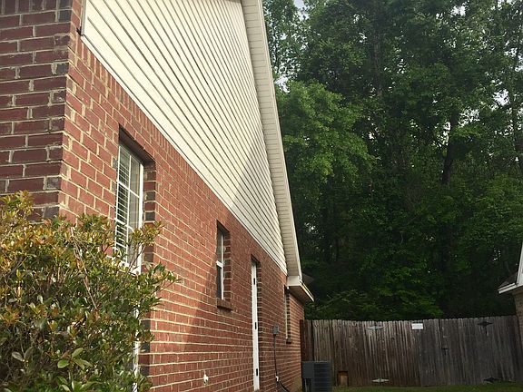 Side Yard With Storage Room