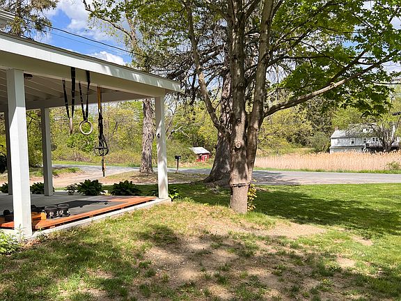 View of South porch and across East Camp Road.
