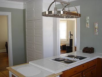 Kitchen with new 30" GE Cooktop, dishwasher, light fixtures and disposal